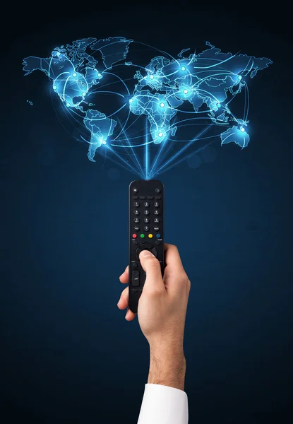 Hand with remote control, social media concept — Stock Photo, Image