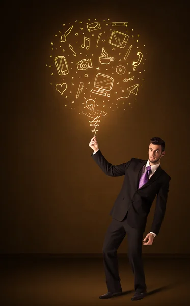 Homme d'affaires avec un ballon de médias sociaux — Photo