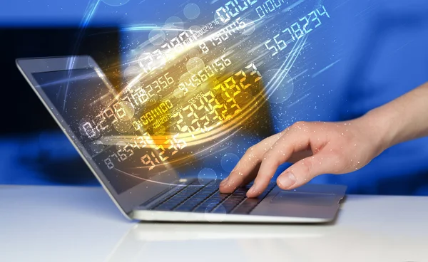 Man typing on modern notebook with number technology data coming — Stock Photo, Image