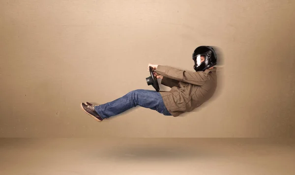 Happy funny man driving a flying car concept — Stock Photo, Image