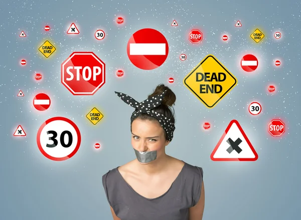 Young woman with glued mouth and traffic signals — Stock Photo, Image