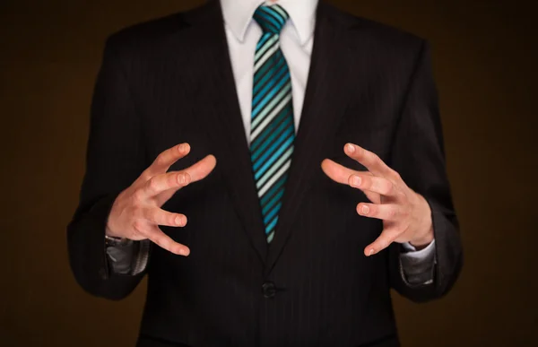 Businessman holding something — Stock Photo, Image