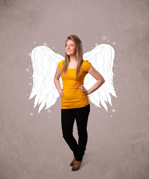 Person with angel illustrated wings on grungy background — Stock Photo, Image