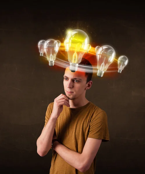 Man with light bulbs circleing around his head — Stock Photo, Image