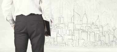Şehir görüşü çizilmiş bir iş adamı