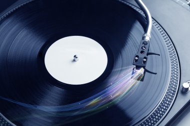 Renkli soyut çizgilerle vinil müzik çalan müzik çalar