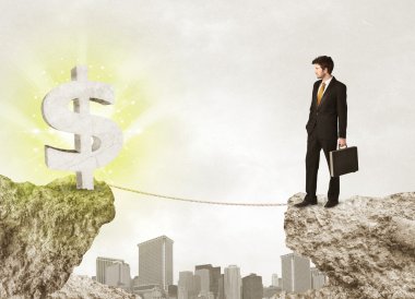 Bir dolar işareti ile rock dağda işadamı