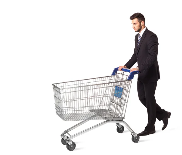Geschäftsmann mit Einkaufswagen — Stockfoto
