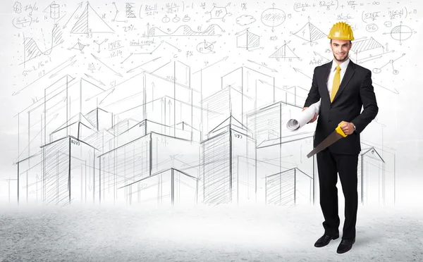 Handsome construction specialist with city drawing in background — Stock Photo, Image