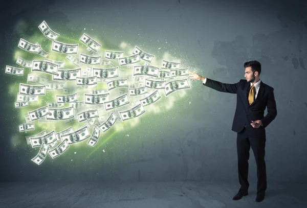 Business person throwing a lot of dollar bills concept — Stock Photo, Image