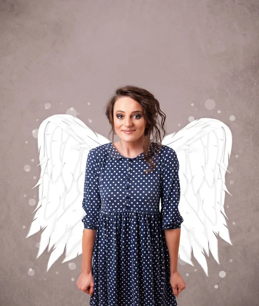 Person with angel illustrated wings on grungy background — Stock Photo, Image