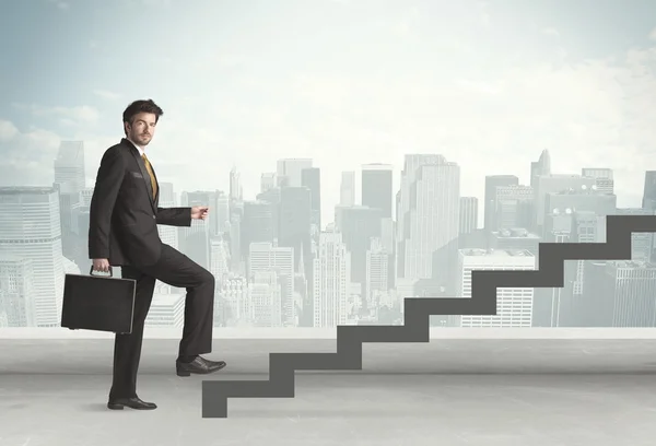 Business person in front of a staircase — Stock Photo, Image