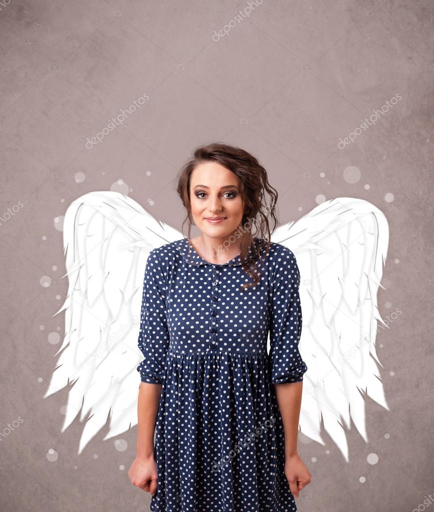 person with angel illustrated wings on grungy background
