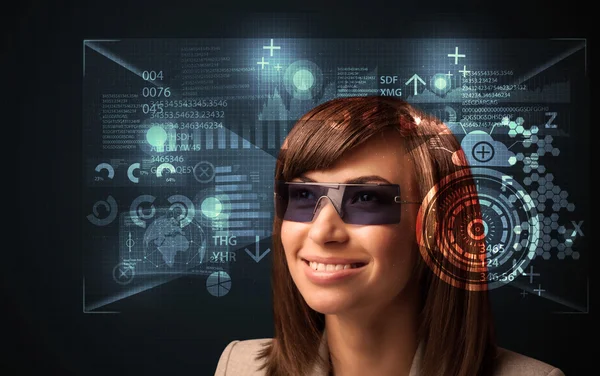 Young woman looking with futuristic smart high tech glasses — Stock Photo, Image