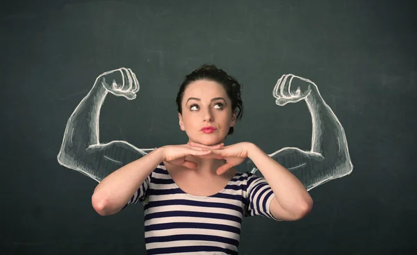 Woman with sketched strong and muscled arms — Stock Photo, Image