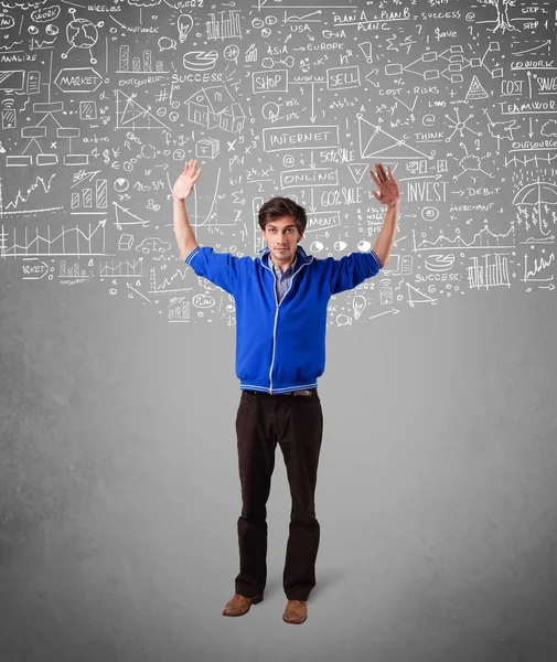 Young handsome guy with hand drawn calculations and icons — Stock Photo, Image