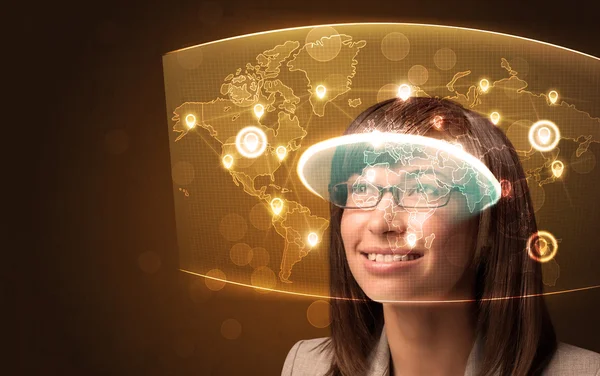 Young woman looking at futuristic social network map — Stock Photo, Image