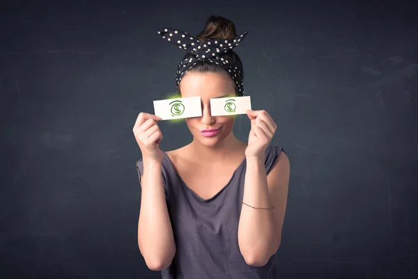 Ung flicka håller papper med grön dollar tecken — Stockfoto