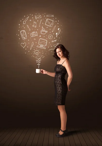 Businesswoman holding a white cup with social media icons — Stock Photo, Image