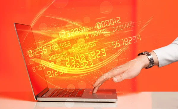 Man typing on modern notebook with number technology data coming — Stock Photo, Image