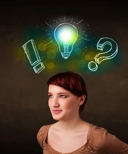 Young preety teenager with hand drawn light bulb illustration — Stock Photo, Image