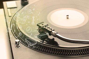 Turntable simge çizilmiş enstrümanlarla klasik müzik çalıyor 