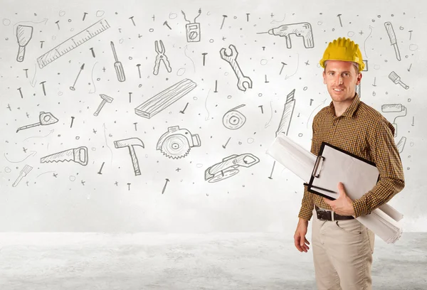 Construction worker planing with hand drawn tool icons — Stock Photo, Image