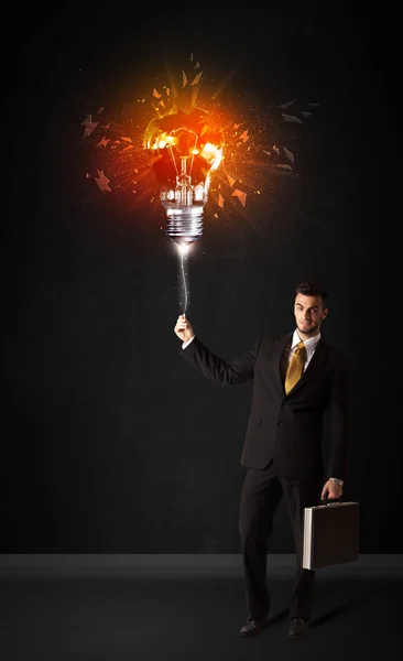 爆発球を持つビジネスマン — ストック写真