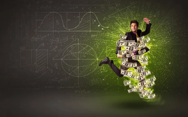 Cheerful businesman jumping with dollar banknotes around him — Stock Photo, Image