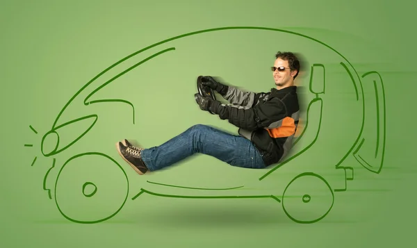 Man drives an eco friendy electric hand drawn car — Stock Photo, Image