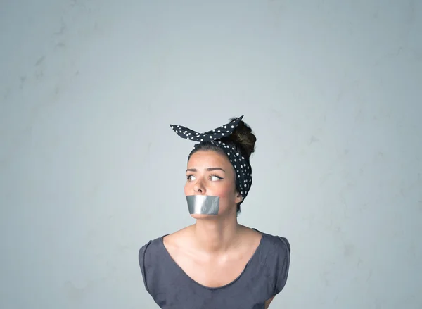 Young woman with glued mouth — Stock Photo, Image