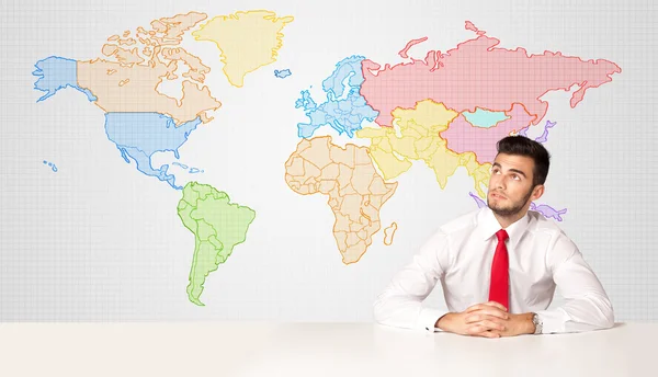 Business man with colorful world map background Stock Photo