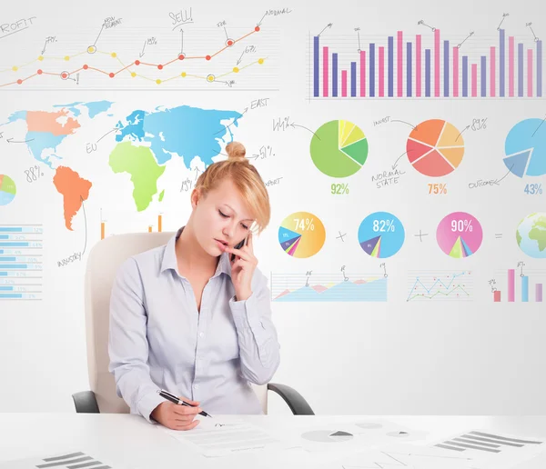 Business woman with colorful charts — Stock Photo, Image