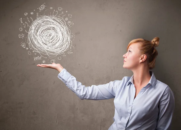 Chaos concept in the hand of a businesswoman — Stock Photo, Image