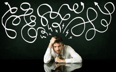 Depresyondaki işadamı çizgili çizgiler altında oturuyor