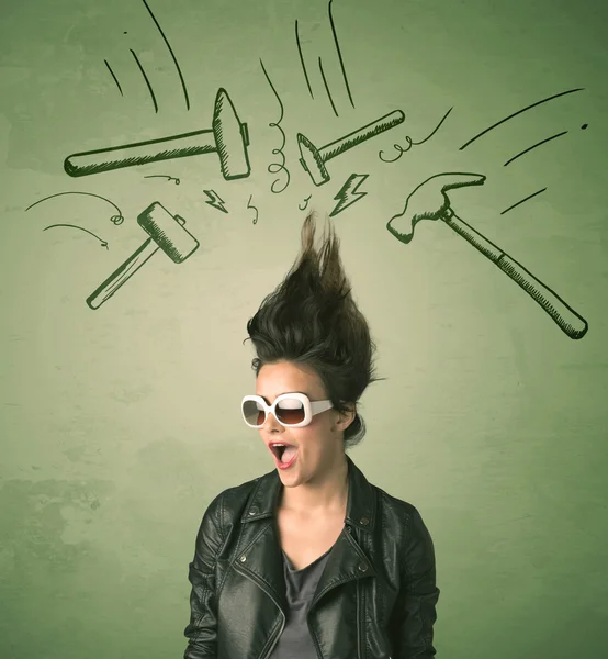 Tired woman with hair style and headache hammer symbols — Stock Photo, Image