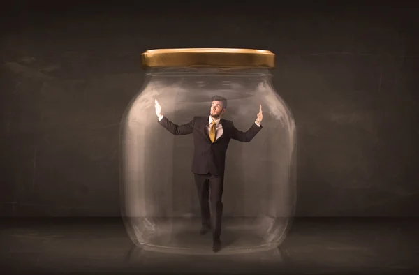 Businessman shut into a glass jar concept — Stock Photo, Image