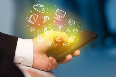 El smartphone Medya simgeler ile tutarak 