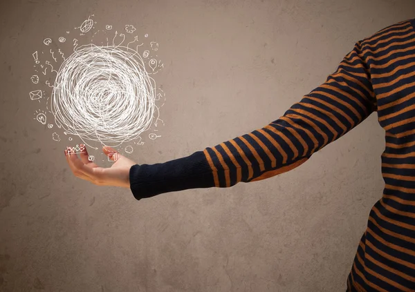 Chaos concept in the hand of a woman — Stock Photo, Image