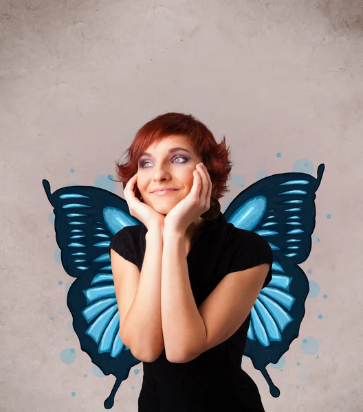 Young girl with butterfly blue illustration on the back — Stock Photo, Image