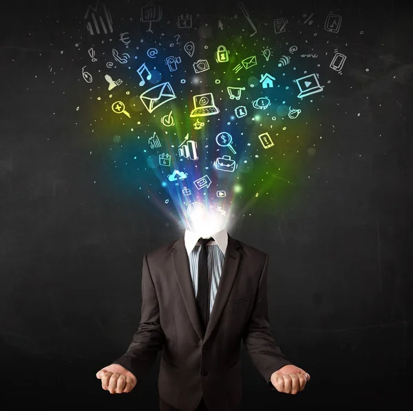 Business man with glowing media icons exploding head — Stock Photo, Image