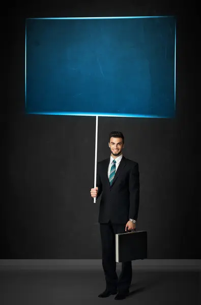 Biznesmen z niebieską planszą — Zdjęcie stockowe