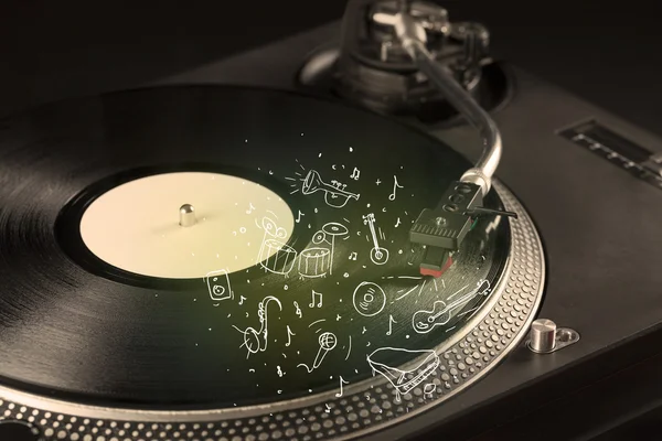 Gramofon grający muzykę klasyczną z instrumentami narysowanymi ikoną — Zdjęcie stockowe