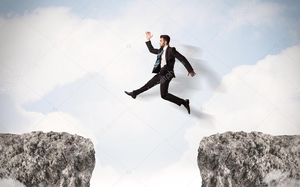 Funny business man jumping over rocks with gap Stock Photo by ©ra2studio 72166149 Funny business man jumping over rocks with gap Stock Photo by ©ra2studio 72166149