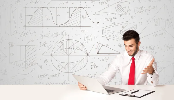 Businessman with business calculations background — Stock Photo, Image