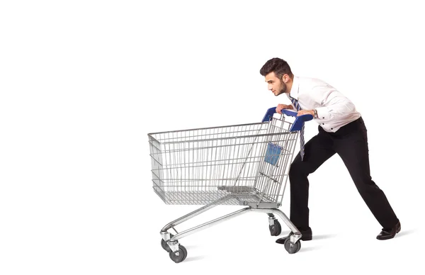 Uomo d'affari con carrello della spesa — Foto Stock