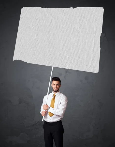 Businessman with blank booklet paper — Stock Photo, Image