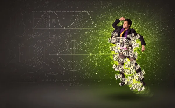 Веселый бизнесмен прыгает с долларовыми банкнотами вокруг себя — стоковое фото
