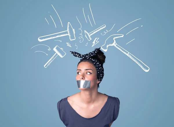 Young woman with glued mouth and hammer marks — Stock Photo, Image