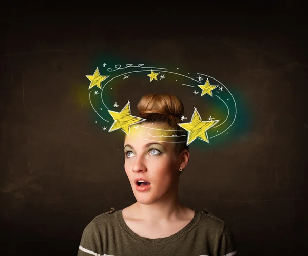 Κορίτσι με κίτρινα αστέρια κύκλο γύρω από την εικόνα του κεφαλιού της — Φωτογραφία Αρχείου